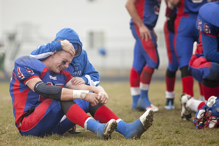 &lt;p&gt;Bigfork tight end Connor Coleman is consoled after the Vikings&#146;
42-0 loss to Malta in a quarterfinal game of the Class B football
playoffs on Saturday afternoon in Bigfork.&lt;/p&gt;