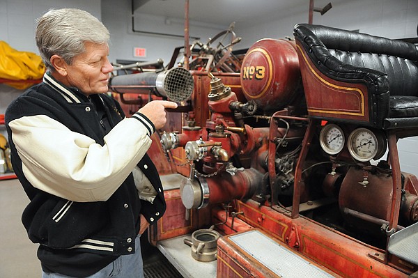 &lt;p&gt;Gus Gustafson, a former firefighter, points out areas of the
American LaFrance fire truck they want to restore on Friday morning
at the Kalispell Fire Department.&lt;/p&gt;