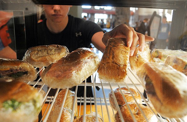 &lt;p&gt;A student at Glacier reaches for one of the healthier options
now available for lunch on Thursday afternoon.&lt;/p&gt;