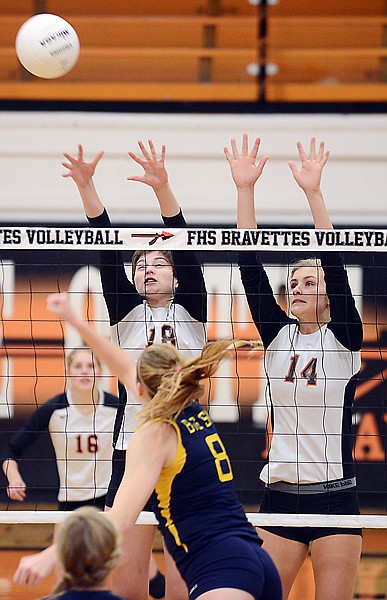 &lt;p&gt;Flathead seniors Sarah Risenhoover (18) and Timi Severson (14) go up for a block in Thursday&#146;s match with Missoula Big Sky at Flathead.&lt;/p&gt;