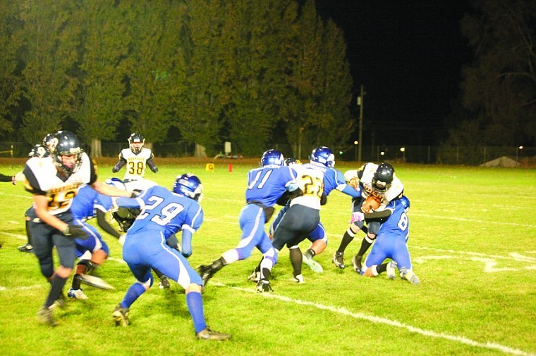 The Cougars cornerback JP Martinez (81) lays a hit on the
Hornets Dustin Nigg during Friday nights action in Warden.