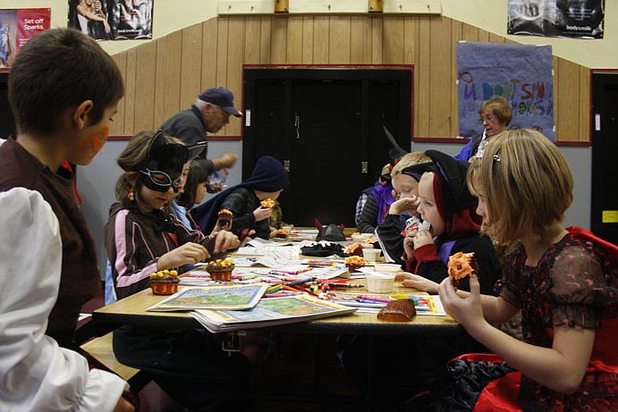 Students enjoy coloring books and treats courtesy of Fred Barrett, the Exalted Ruler of the Clark Fork Valley Elks Association.