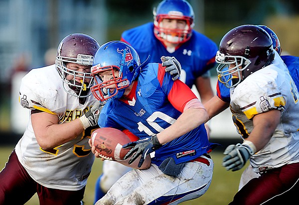 &lt;p&gt;Bigfork quarterback Josh Sandry (10) is tackled by Baker senior Jeff Fisher (left) during a Class B quarterfinal playoff game on Saturday in Bigfork.&lt;/p&gt;