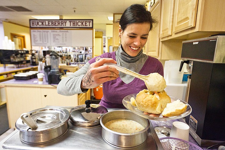 &lt;p&gt;SHAWN GUST/Press Heather Rae, sales associate for The Huckleberry Thicket, pour chowder into a bread bowl Monday at the store's cafe in the Silverlake Mall. The huckleberry-themed gift shop is celebrating its grand opening this weekend.&lt;/p&gt;