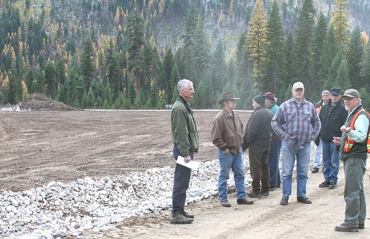 &lt;p&gt;DEQ Project Officer Daryl Reed (right) speaks with the tour
group about the new repository north of Superior. Pictured in the
group is Steve Ackerlund, Kelly Dillon, Tim Read, Dennis
Hildebrand, Bob Winegar and Jim Schultz.&lt;/p&gt;