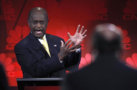 &lt;p&gt;Republican presidential candidate businessman Herman Cain speaks during a Republican Presidential Debate at Oakland University in Auburn Hills, Mich., Wednesday, Nov. 9, 2011. (AP Photo/Paul Sancya)&lt;/p&gt;