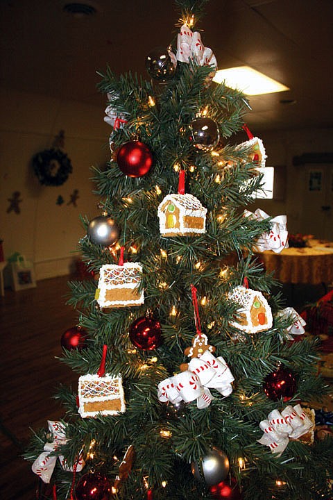 The decorator of this tree took the time to handmake each little gingerbread house that hangs on the branches as an ornament.