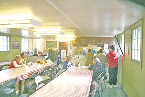 &lt;p&gt;Folks lined up at the heritag Museum&#146;s Cookhouse to get some delicious food before shopping for crafts in the adjacent building. Pulled pork, sausages and burgers could be slathered with grilled onions for hungry patrons.&lt;/p&gt;