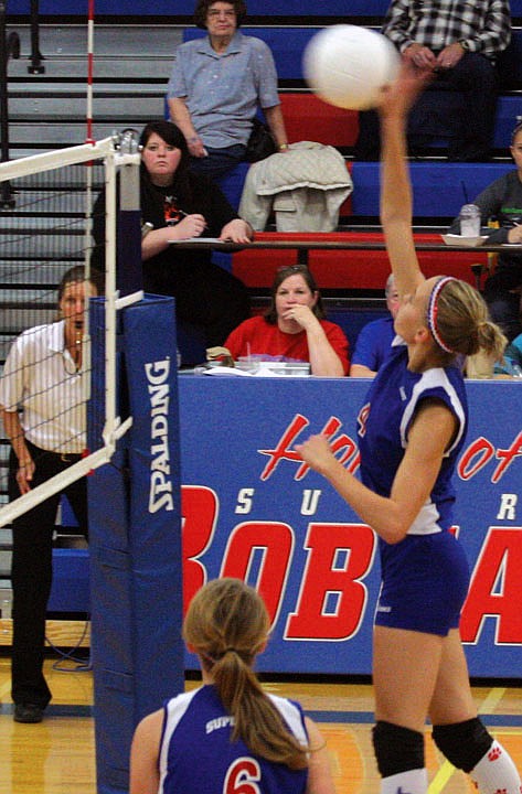 Kaitlynn Koke hits the ball against Eureka on Thursday during divisional volleyball.