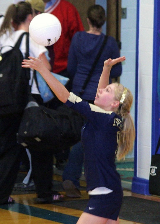 Erica Sorlie, a freshman, serves one up for Thompson Falls over the weekend in Superior.