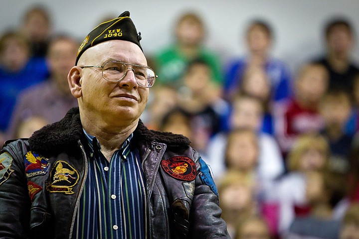 &lt;p&gt;Steve Stefanski, Marine Corps veteran, stands as the choir with Ponderosa Elementary sings the &quot;Marines' Hymn&quot; during a veterans assembly.&lt;/p&gt;