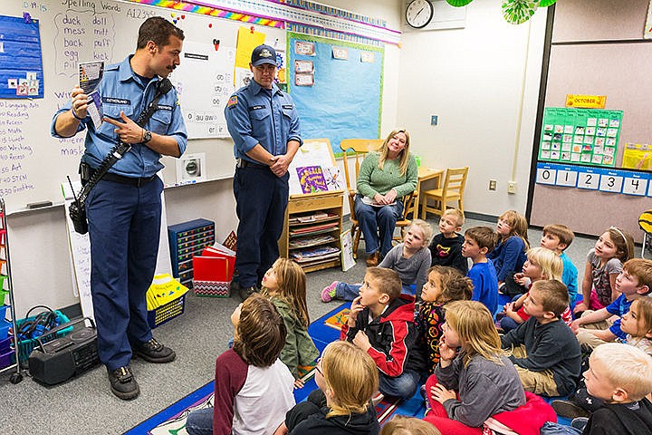 &lt;p&gt;Firefighters with the Coeur d&#146;Alene Fire Department Josh Sutherland, left, and Don Bates talk about healthy snack choices to Melanie Hennig&#146;s first grade class after delivering cookbooks, that include favorite recipes from the staff at the department, during a visit to the Fernan STEM Academy on Thursday. The books were created in a joint effort with CDAFD, the University of Idaho and the Coeur d&#146;Alene School District in an effort to promote healthy eating and staying active.&lt;/p&gt;