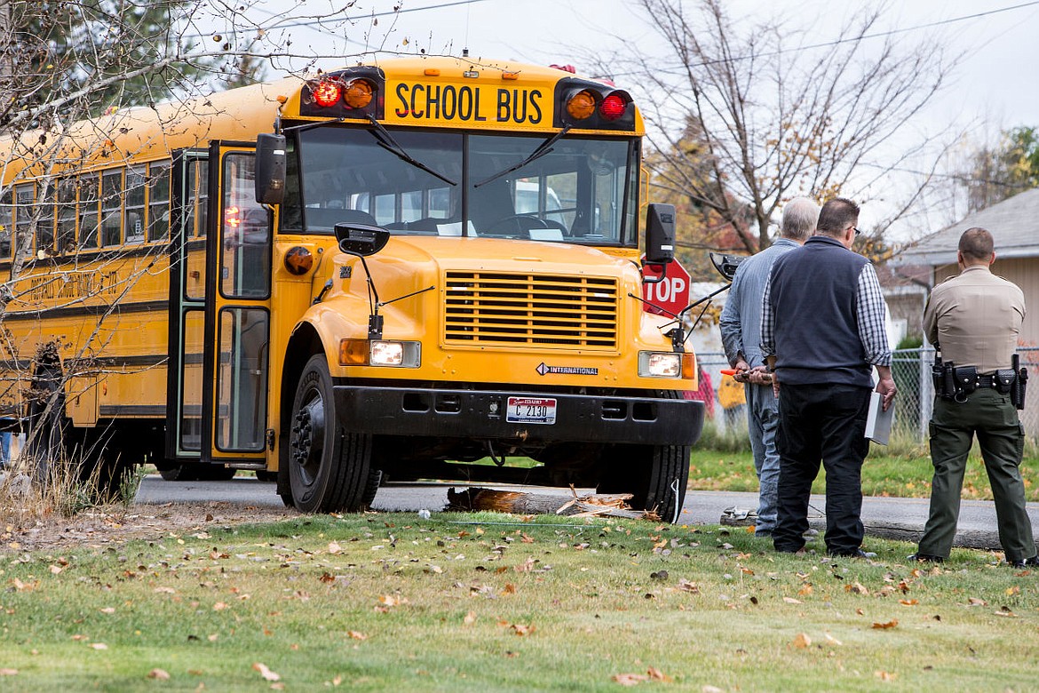 &lt;p&gt;A telephone utility pole lies underneath a Post Falls School District school bus after the bus carrying students from struck the pole on Thursday near the intersection of 12th Avenue and Syringa Street in Post Falls. No injuries were reported.&lt;/p&gt;