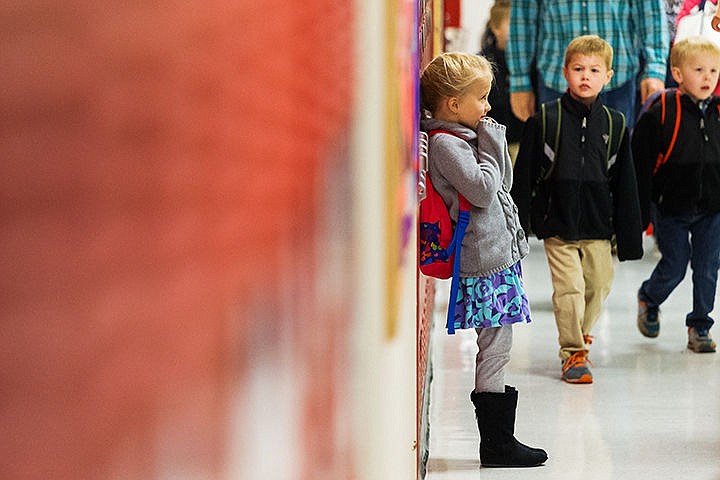 &lt;p&gt;Naomi Monteith pauses near a row of lockers outside her first grade classroom Tuesday as the first day of school begins at Bryan Elementary School in Coeur d&#146;Alene.&lt;/p&gt;