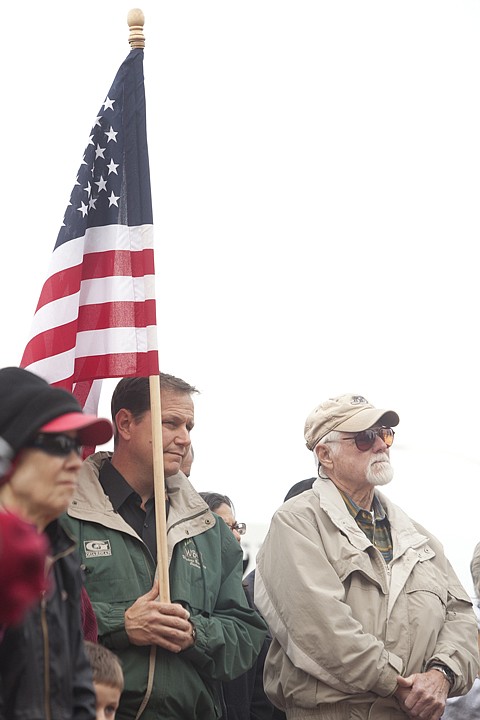 &lt;p&gt;Derek Skees, left, and Larry Jensen listen as music is played
during the Veterans Day ceremony at Depot Park in Kalispell Friday
morning.&lt;/p&gt;