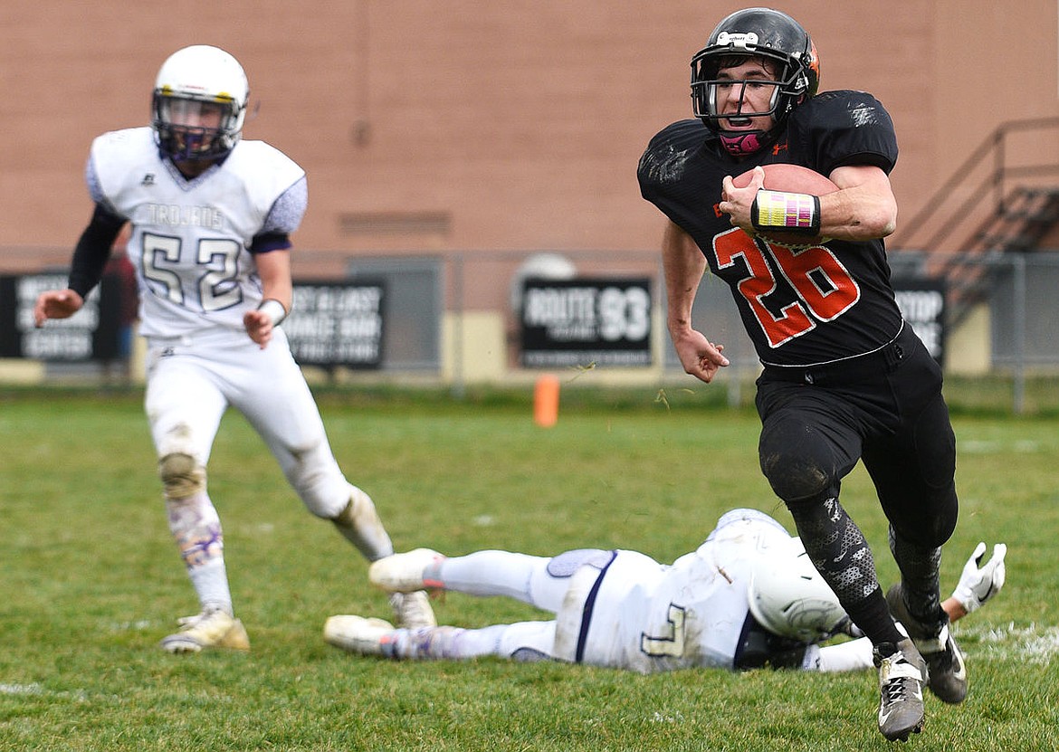 &lt;p&gt;Eureka running back Cannan Smith breaks the tackle of Whitehall defensive back Wyatt Alexander and sprints to the end zone for his third touchdown of the day during the third quarter of the Lions' 36-7 victory in the Class B semifinals in Eureka Saturday. Smith finished with five touchdowns. (Aaric Bryan/Daily Inter Lake)&lt;/p&gt;