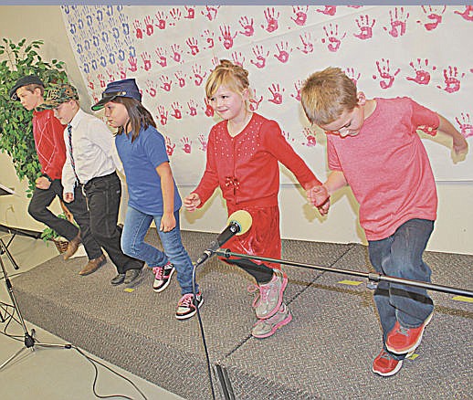 &lt;p&gt;From left to right: Glacier View School students Noah, 9, Sunny, 8, Navonntah, 9, Jasper, 6, and Kain, 6 performed a series of songs and poems to honor the military veterans and the country. Vince Lovato / Leader photos&lt;/p&gt;