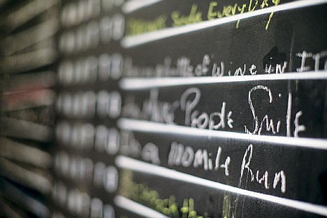 &lt;p&gt;Attendees of the exhibit are welcome to add to the existing statements on the chalkboard door panels.&lt;/p&gt;