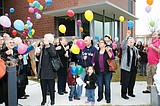 Balloons released in memory of hospice patients