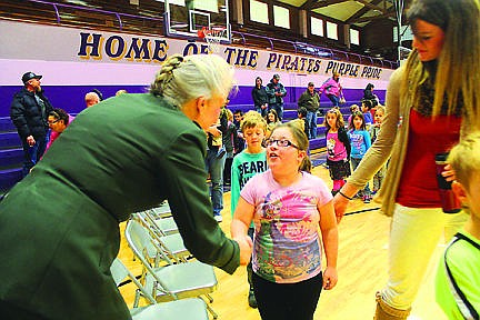 &lt;p&gt;Above: District Court Judge and retired Army Capt. Kim Christopher shakes hands with&#160; Linderman student Nevaeh. The 7-year-old is in Mrs. Seifert&#146;s second-grade class.&lt;/p&gt;&lt;p&gt;&#160;&#160; &#160;&#160;&#160;&#160;&#160;&#160;&#160;&#160;&#160;&#160;&#160;&#160;&#160;&#160;&#160;&#160;&#160;&lt;/p&gt;