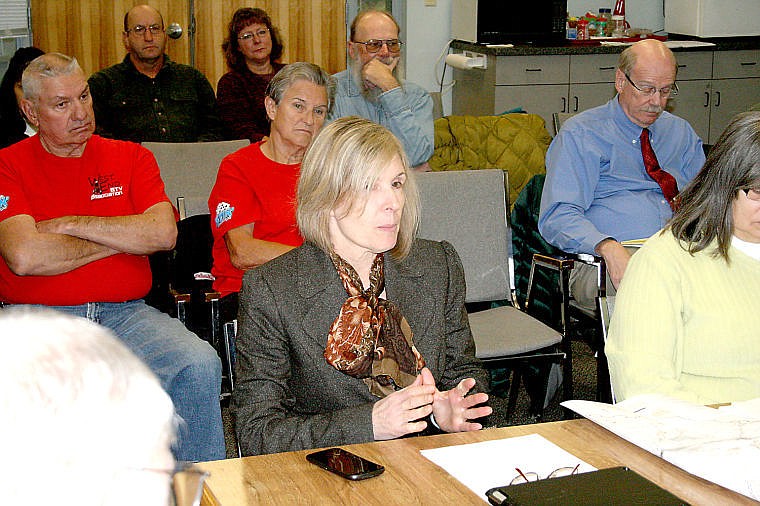 &lt;p&gt;Janet Hanson, superintendent of St. Regis schools, discusses issues with the Route of the Olympian during the weekly county commissioner meeting.&lt;/p&gt;