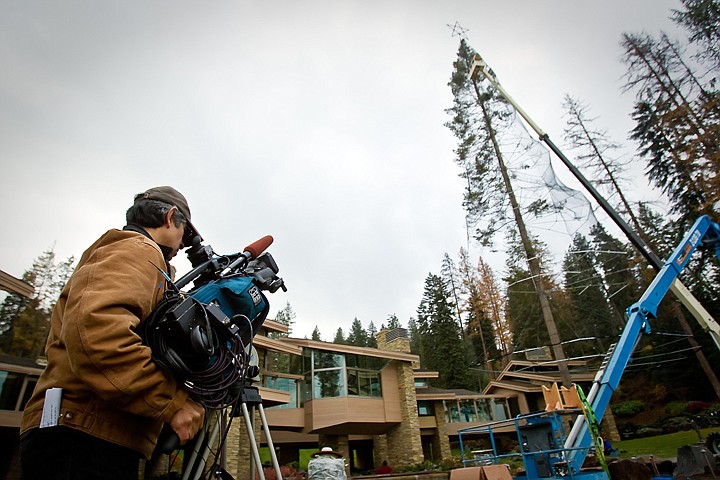 &lt;p&gt;David Sanchez films crews working from a crane as they begin to string the three miles of lights that will light up the World's Tallest Animated Tree which will be featured on TLC's show &quot;Extreme Christmas Trees.&quot;&lt;/p&gt;