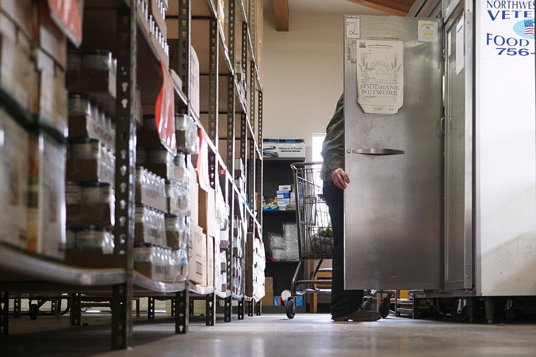 &lt;p&gt;Patrick Cote/Daily Inter Lake A veteran looks in a freezer while getting his food Friday morning at the Veterans Pantry in Kalispell. Friday, Nov. 9, 2012 in Kalispell, Montana.&lt;/p&gt;