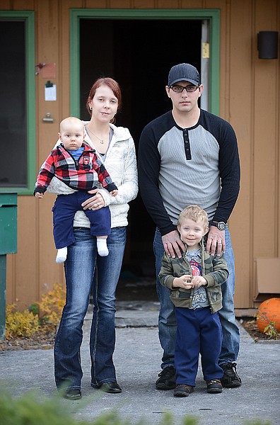 &lt;p&gt;Tyrel and Franziska Disney stand outside the office at Mountain Mini Storage with their children, Emmit, 8 months, and Tyler, 3, Tuesday afternoon in Whitefish. The family lost most of their possessions in a fire in the early hours of Nov. 2.&lt;/p&gt;