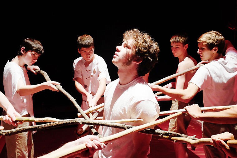 &lt;p&gt;Jaben Wood, who plays Simon, is surrounded during a recent rehearsal for &quot;Lord of the Flies&quot; at Flathead High School.&lt;/p&gt;