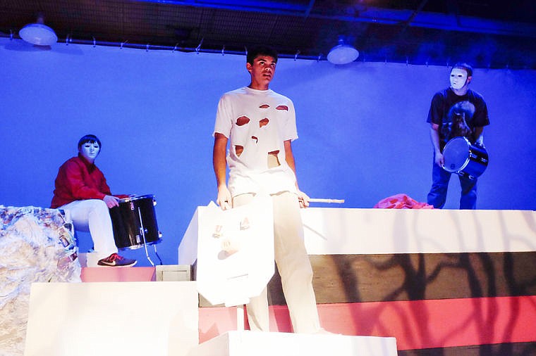 &lt;p&gt;Tristin Hennessey, center, performs during a recent rehearsal for &quot;Lord of the Flies&quot; at Flathead High School. In the masks are members of the Band of Savages, students who will perform original music throughout the play and act as menacing spirits on the island.&lt;/p&gt;