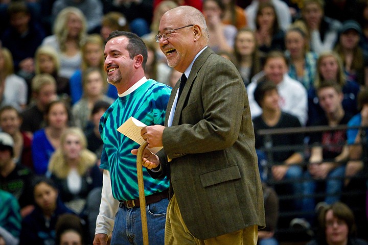 &lt;p&gt;JEROME A. POLLOS/Press Galen Louis walks alongside his son, Kelly Reed who is a teacher and coach at Lake City High School, after he was named November's First Class School Champion at an assembly Friday. Reed was nominated by one of his students, Kierstie Shellman. &quot;He is a very positive guy and always has words of encouragement,&quot; Shellman wrote about Reed in her nomination letter. Whether you're an A-plus student, or a student just struggling to get by, Mr. Reed will help you get you where you want to be.&quot;&lt;/p&gt;