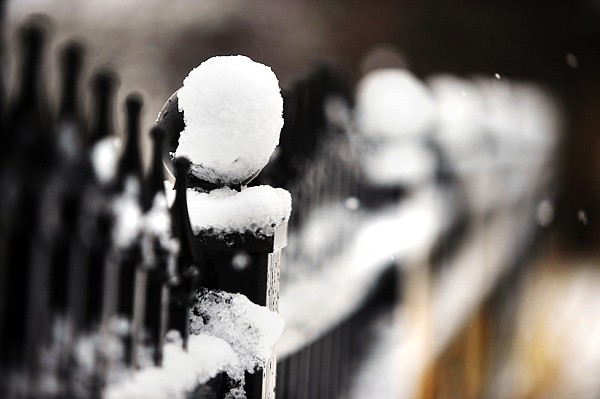 &lt;p&gt;A wrought iron fence is slowly caked by still falling snow on
Monday morning in Somers.&lt;/p&gt;