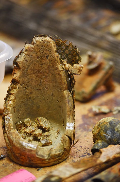 <p>Detail of the remains of a candle holder, one of the items recovered from the sunken remains of the Kee-O-Mee that will be on display at the Museum at Central School in the History of the Flathead Valley exhibition. (Brenda Ahearn/Daily Inter Lake)</p>