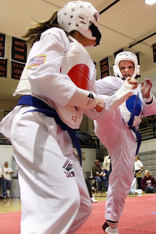 Shawn Plummer challenges Rose Bear Don't Walk during the 12th Annual Big Sky Martial Arts Championship at Flathead High School Saturday afternoon.