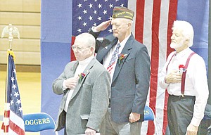 &lt;p&gt;Guest speakers Jim Shadle, left, Ed Croucher and John Alex during the National Anthem.&lt;/p&gt;