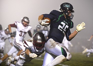 <p>Glacier's Jackson Pepe rushes upfield on a long kick return during the first quarter of the Wolfpack's 29-14 win over the Helena Bengals in the Class AA semifinals at Legends Stadium on Friday. (Aaric Bryan/Daily Inter Lake)</p>
