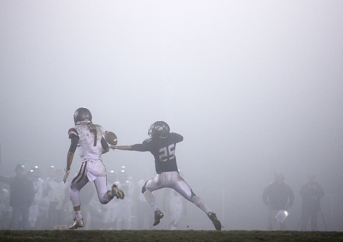 &lt;p&gt;Glacier reciever Jackson Pepe stretches out as he attempts to haul in a pass during the Wolfpack's 29-14 victory on a foggy night at Legends Stadium on Friday. With the victory the Wolfpack will advance to the state championship against Billings Senior. (Aaric Bryan/Daily Inter Lake)&lt;/p&gt;