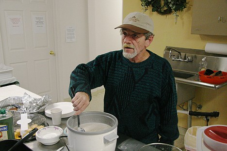 &lt;p&gt;Fresh Start volunteer Charles Harris stirs a pot of oatmeal on Saturday morning. The Fresh Start center will offer services to 20,000 homeless men, women and children this year.&lt;/p&gt;