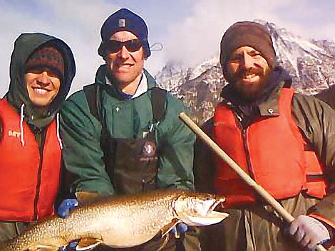 From left, Ben Galloway, Clint Muhlfeld and Vin d&#146;Angelo show off one of the adult lake trout that were netted from Quartz Lake in Glacier National Park this fall. Others on the U.S. Geological Survey netting crew included Carter Fredenberg and Tara Marotz.