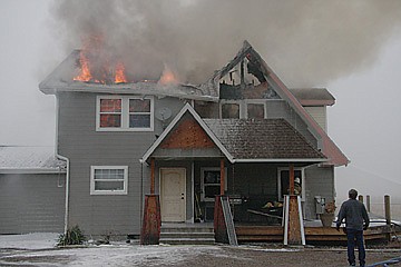 &lt;p&gt;Flames engulf a home on Buffalo Bridge Road last&#160; Thursday morning. The blaze may have started in the chimney of fireplace, as it began shortly after the homeowner stoked the fire and left for work.&lt;/p&gt;