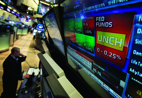 &lt;p&gt;A television screen on the floor of the New York Stock Exchange shows the decision of the Federal Reserve, Wednesday, Oct. 24, 2012. The Fed took no new action after a two-day policy meeting. It wants time to assess whether aggressive steps launched in September will boost growth and job creation. (AP Photo/Richard Drew)&lt;/p&gt;