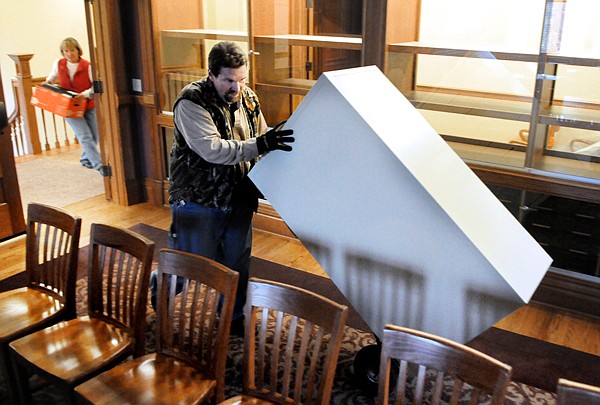 &lt;p&gt;Mike Hovila of the Building Maintenance crew moves a filing
cabnet into the third floor of the newly renovated courthouse on
Tuesday morning.&lt;/p&gt;