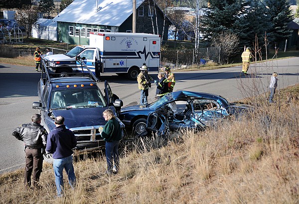 &lt;p&gt;First responders gather around two vehicles involved in a crash
on Thursday afternoon at the intersection of Middle Road and
Grosney Cross east of Kalispell.&lt;/p&gt;