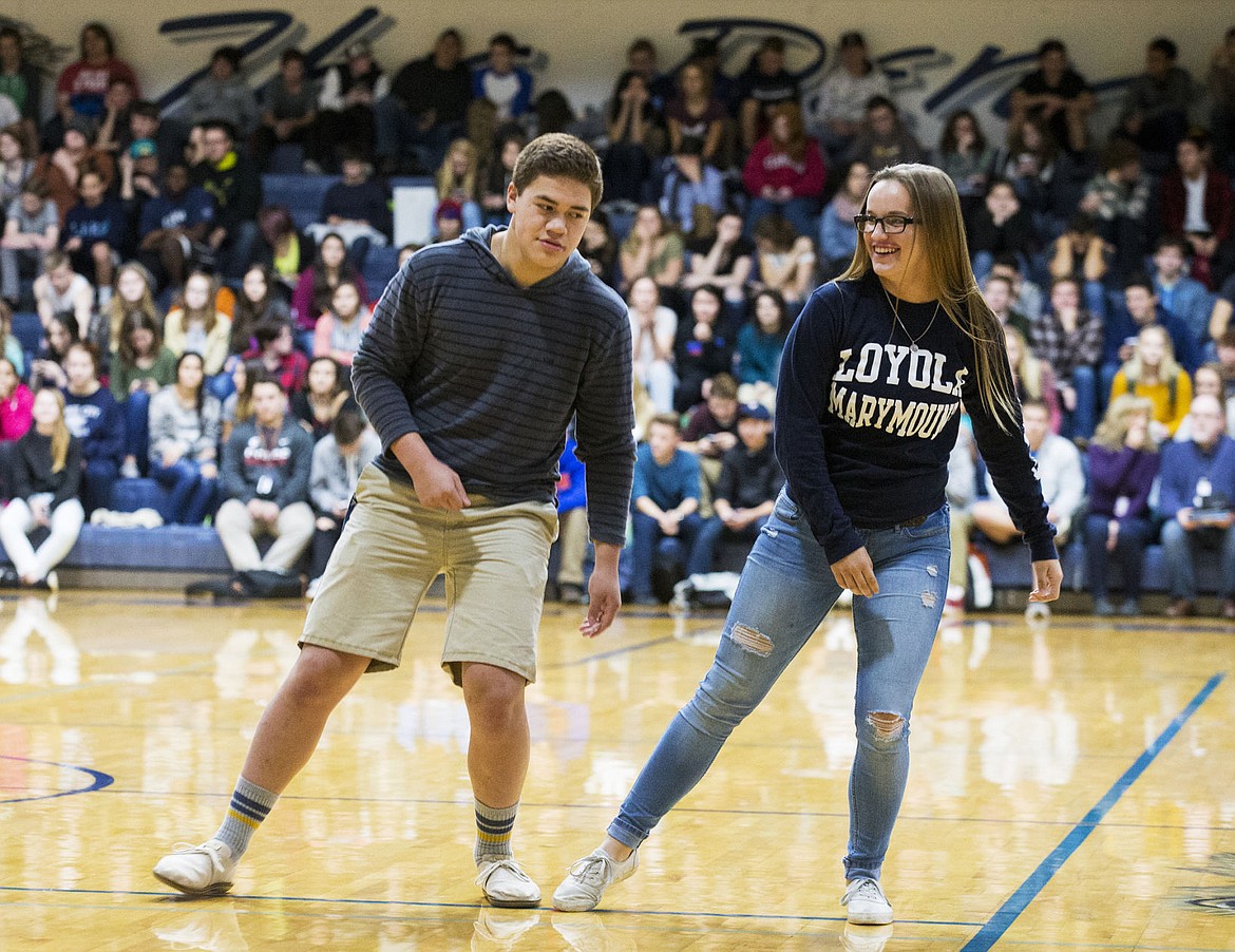 &lt;p&gt;To the music of Powwow Sweat, seniors Rusty Dan and Chloe Falciani learn the steps to a tradition Native American dance during an assembly at Lake City High School on Tuesday.&lt;/p&gt;