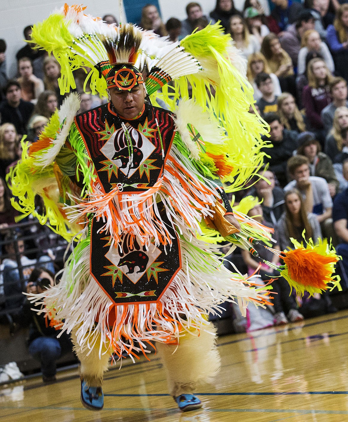 &lt;p&gt;Dressed in traditional regalia, Coeur d'Alene Tribe member Butch Nomee dances during Lake City High School's first Native American Heritage Month assembly on Tuesday.&lt;/p&gt;