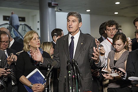 &lt;p&gt;Sen. Mary Landrieu, D-La., chair of the Senate Energy Committee, left, listens as Sen. Joe Manchin, D-W. Va., a member of the committee, speaks to reporters about the new urgency to get congressional approval for the Canada-to-Texas Keystone XL pipeline, at the Capitol in Washington on Wednesday.&#160;&lt;/p&gt;