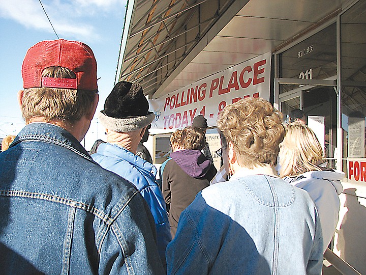 Voters wait in the front of 211 N. Elder St. in Moses Lake last
year. They were standing in line to cast their ballots in the Moses
Lake Irrigation &amp; Rehabilitation District election.