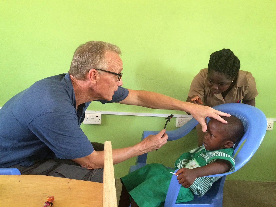 &lt;p&gt;Courtesy photo&lt;/p&gt;&lt;p&gt;Dr. Justin StormoGipson, of Coeur d'Alene, performs an eye exam for a student at Home Redemption School in Anloga, Volta Region, Ghana. StormoGipson, who volunteered his services on a recent trip to that country, examined over 200 schoolchildren and 25 staff members.&lt;/p&gt;