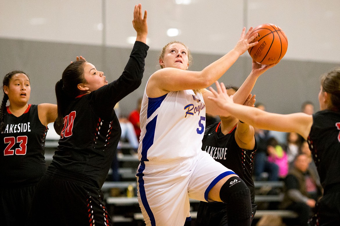 &lt;p&gt;JAKE PARRISH/Press North Idaho Christian School's Sophie Kruse drives towards the basket as Samantha Adrian (20) of Lakeside defends on Tuesday at The HUB Sports Center in Liberty Lake.&lt;/p&gt;