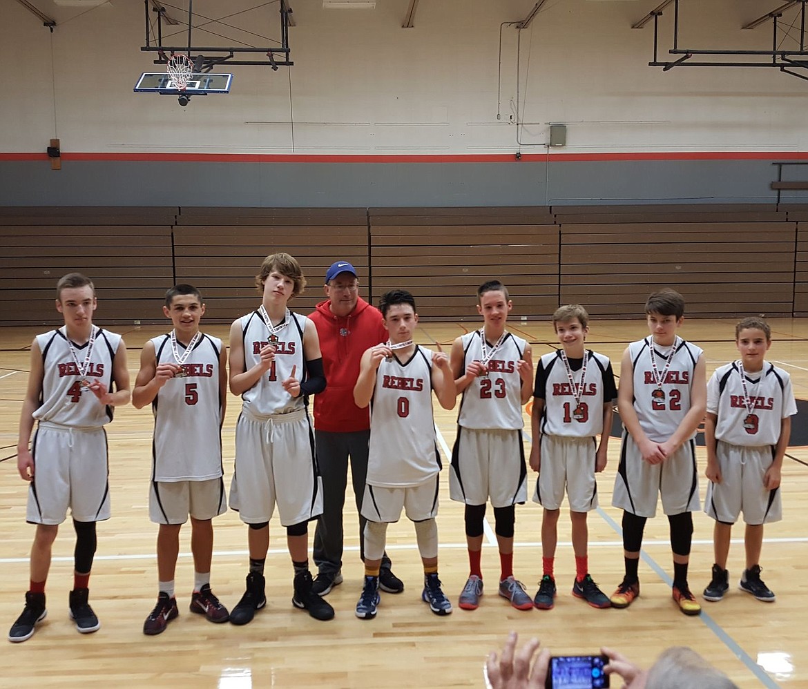 &lt;p&gt;Courtesy photo&lt;/p&gt;&lt;p&gt;The River City Running Rebels Red boys eighth-grade AAU basketball team posted a 5-1 record to win the Post Falls youth basketball tournament last weekend at Post Falls Middle School. From left are Kevin Wraith, Lars Horning, Brady Christensen, coach Al Arnone, Christian Curlee, Derek Curtis, Tyler Arnone, Dylan Brown and Joshia Heath.&lt;/p&gt;